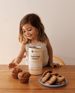 Child eating baked snacks made with Thriving Family Unflavoured protein powder